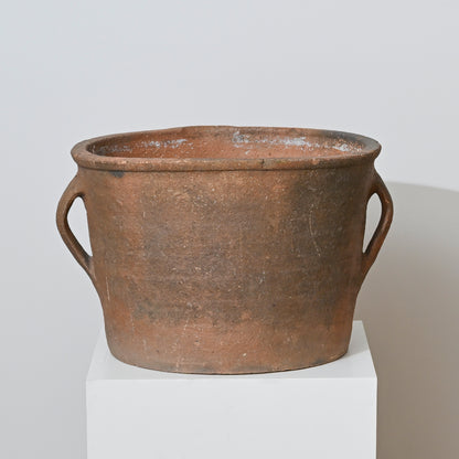Rustic 19th century french terracotta vessel with two looped handles and weathered brown surface with tone variations