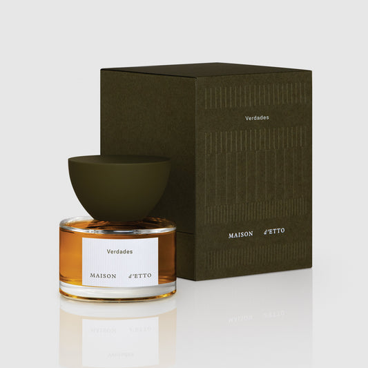 Maison d’Etto fragrance Verdades perfume in a clear glass bottle with olive green cap and matching dark green packaging