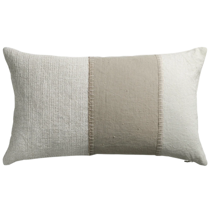 Rectangular painted linen panel pillow with textured off-white fabric and subtle vertical stitching details