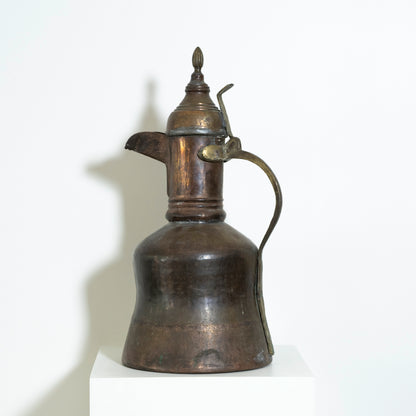 Vintage brass oil lamp on a white background