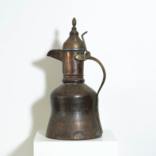 Vintage brass oil lamp on a white background