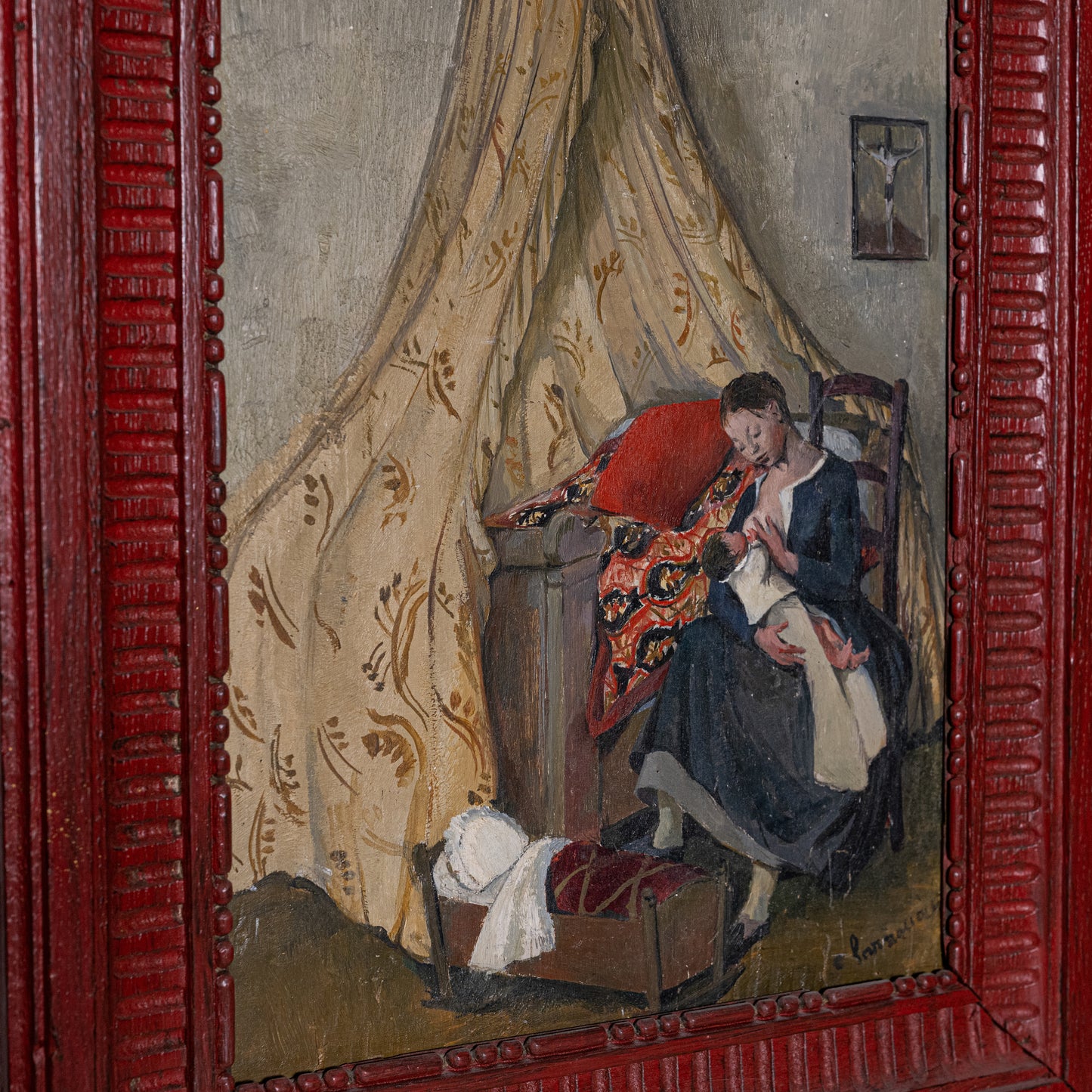 Red carved wooden picture frame surrounding a 19th century oil painting of woman and child