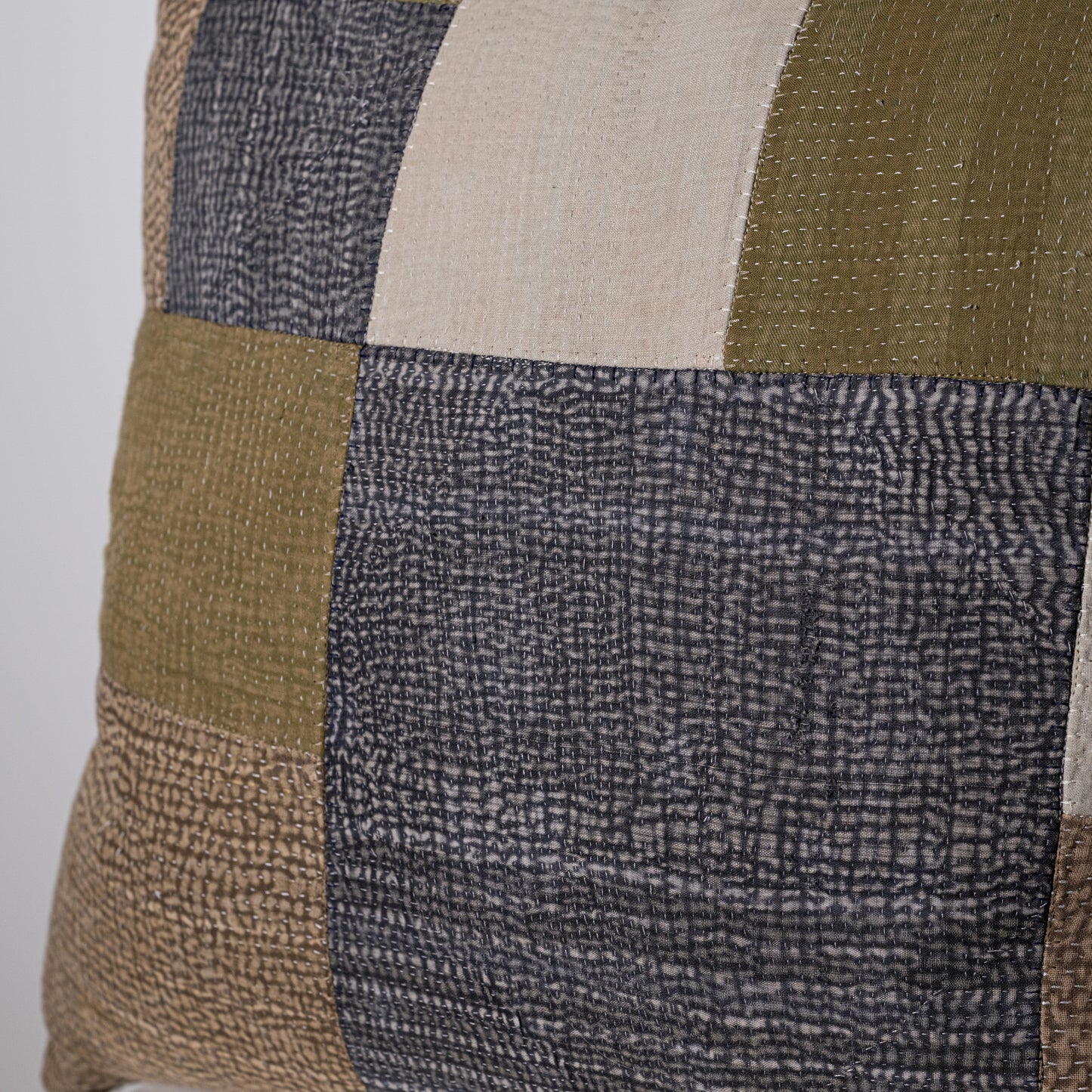 Mosaic pillow patchwork cushion with textured woven fabric in olive green beige and dark gray earthy tones