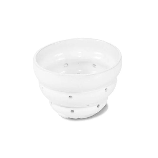 White ceramic berry bowl.