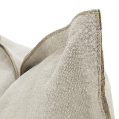 Beige linen pillow with neatly stitched edges.