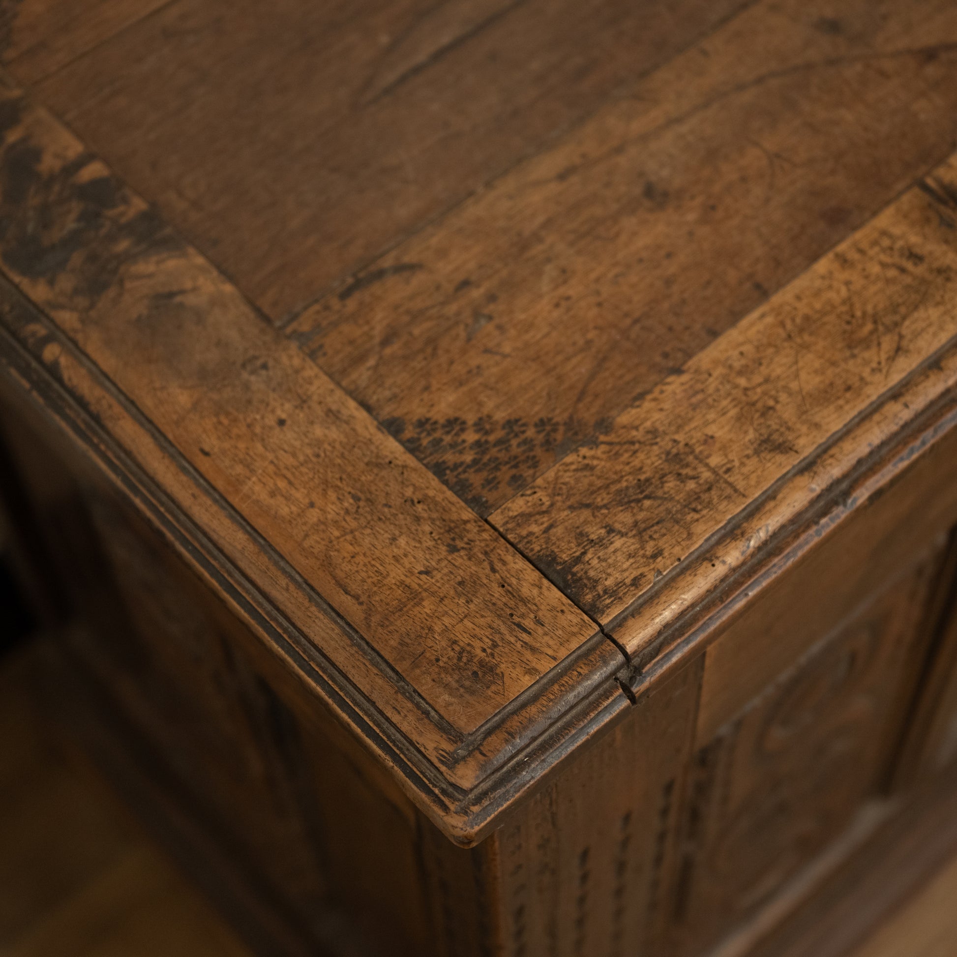 19th century French carved mountain chest antique wooden chest with rich weathered brown finish and visible grain patterns