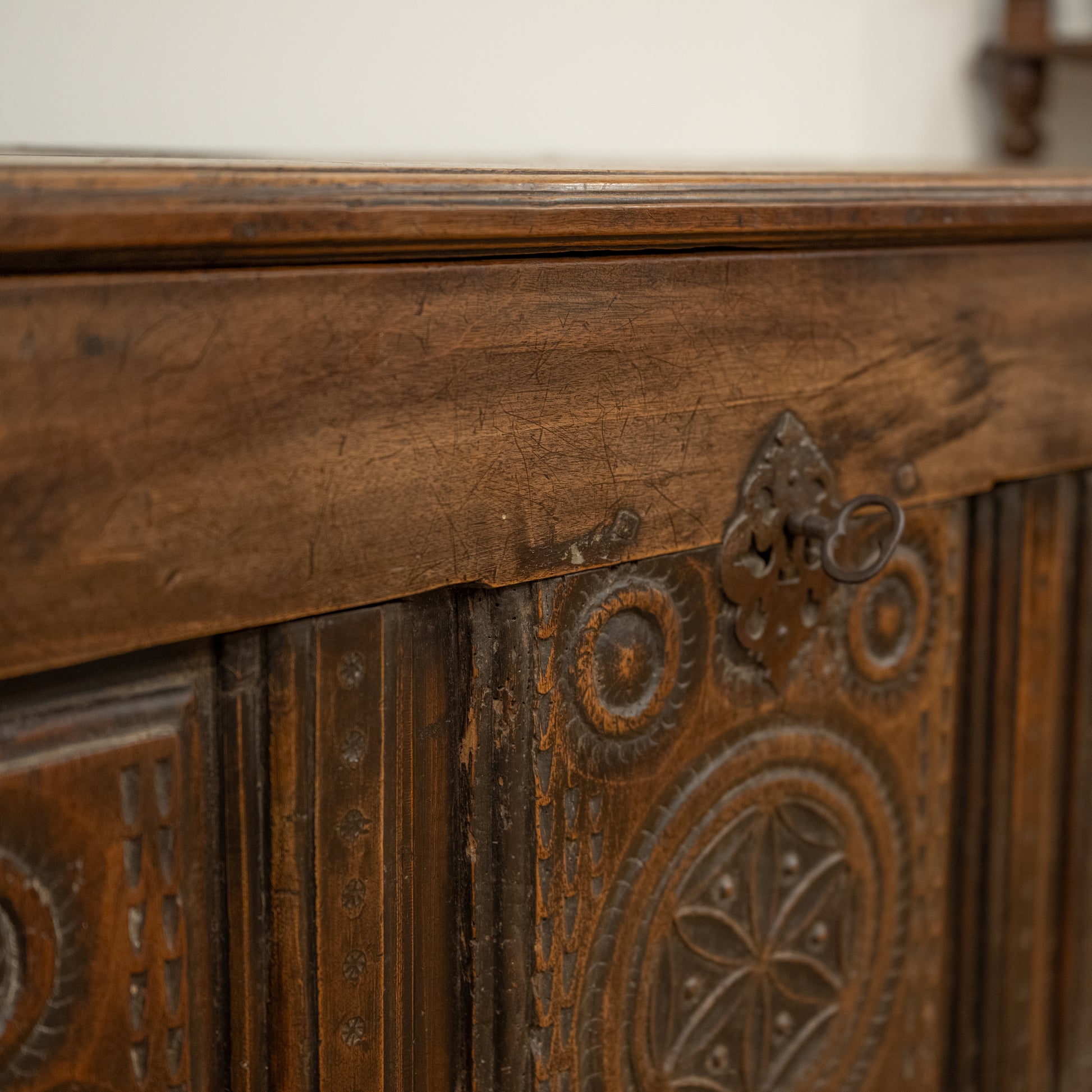 Antique 19th century French carved mountain chest in dark brown wood with intricate detailed carvings